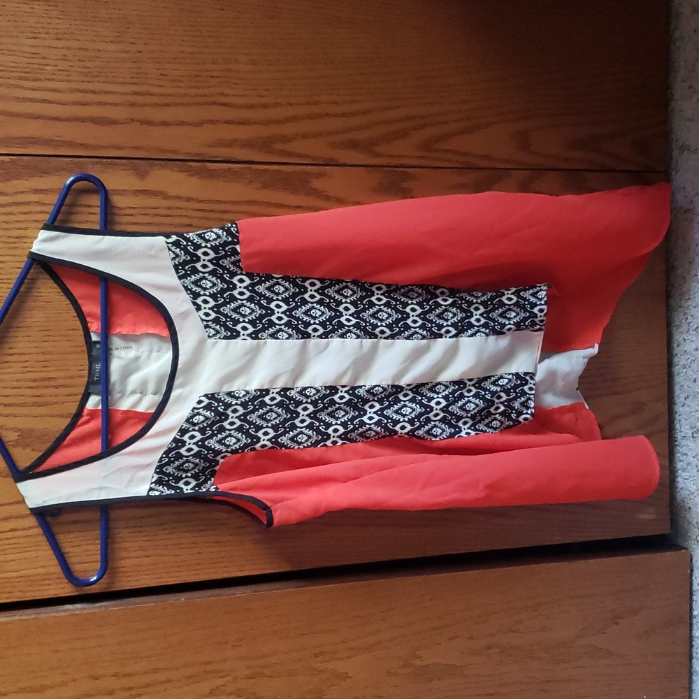 THML brand, medium with orange white and then black print.